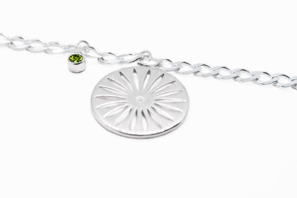 SS-starburst-brac-with-peridot-charm-1024×683