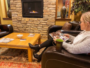 customer-waits-by-fireplace Customer waiting by fireplace